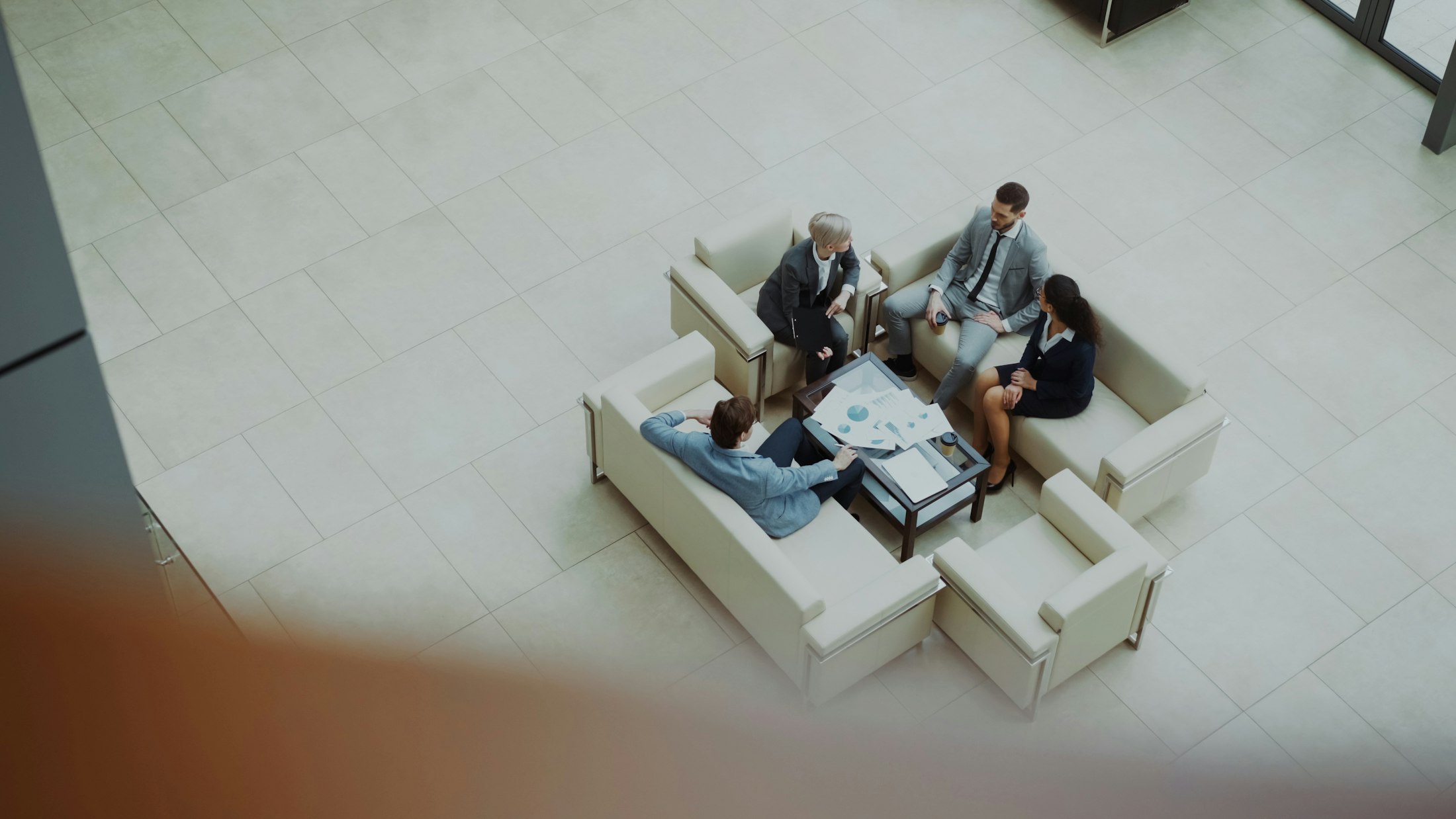 Enterprise leaders collaborating in a modern workspace